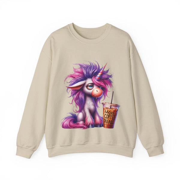 Beige sweatshirt with a colorful unicorn design holding a coffee cup on a white background