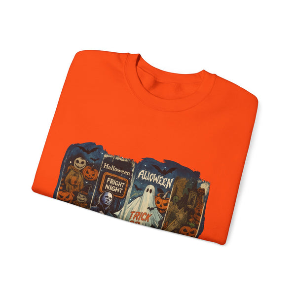 Folded orange t-shirt with Halloween-themed design on a white background