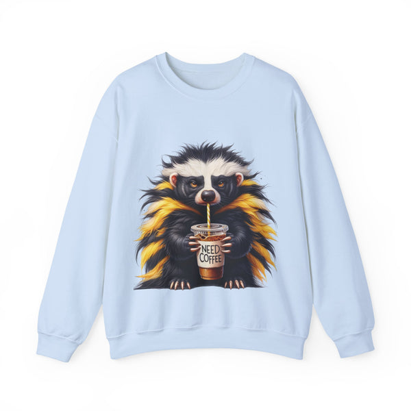 Light blue sweatshirt with a raccoon graphic holding a coffee cup on a white background