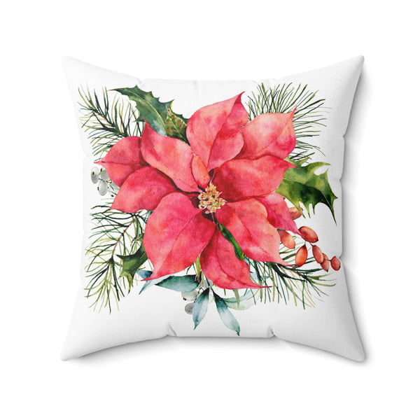 Back of Christmas throw pillow featuring a watercolor red poinsettia with holly and pine boughs.