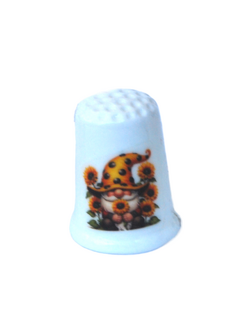 Collectible thimble featuring a sunflower garden gnome
