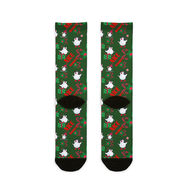 Green socks with festive design on a white background