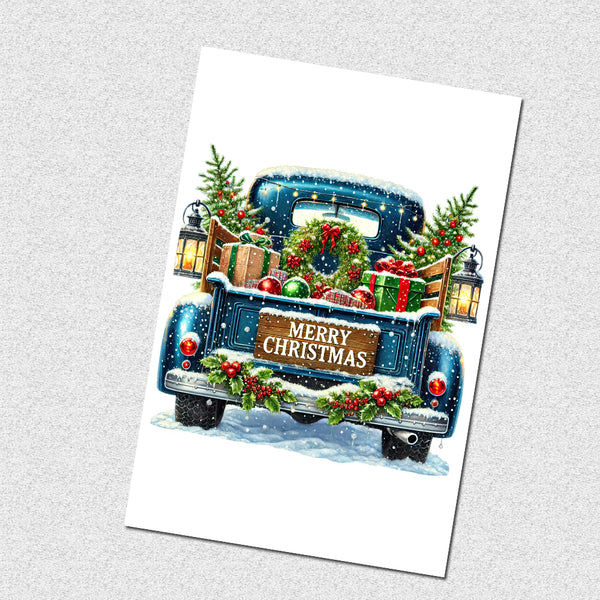 Christmas card with a decorated truck and 'Merry Christmas' text on a white background