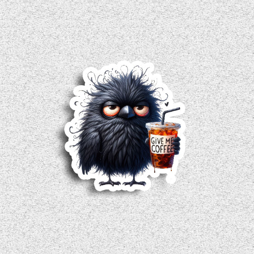 Illustration of a fluffy black creature holding a 'Give Me Coffee!' cup on a textured gray background