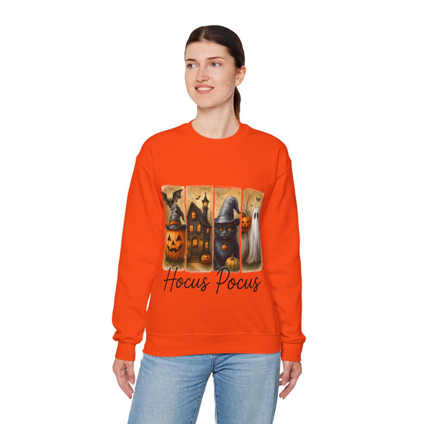 Person wearing an orange sweatshirt with Halloween-themed design and 'Hocus Pocus' text on a white background