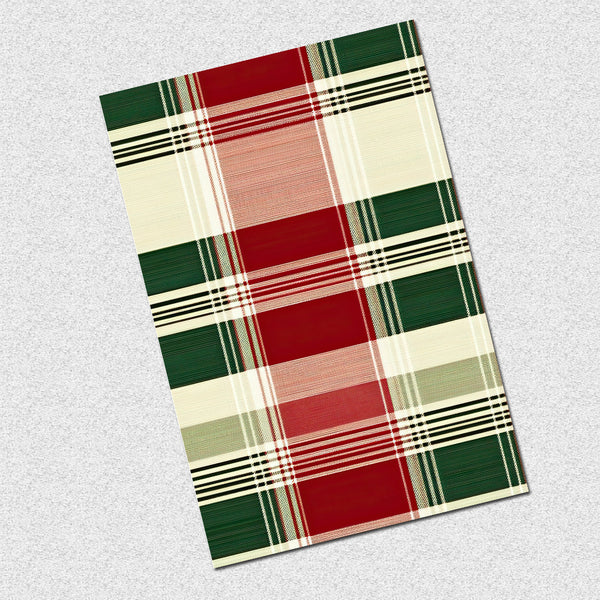 Plaid patterned towel with red, green, and beige colors on a light gray background