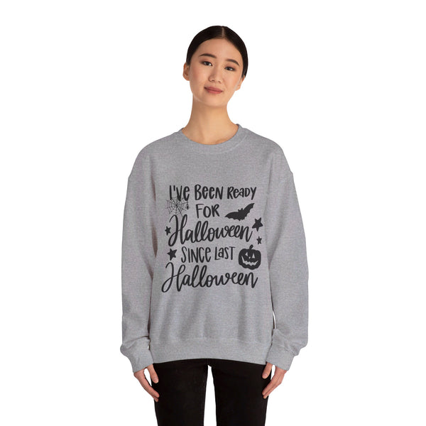 Woman wearing a sport grey womens Halloween sweatshirt that says I've been ready for Halloween since last Halloween