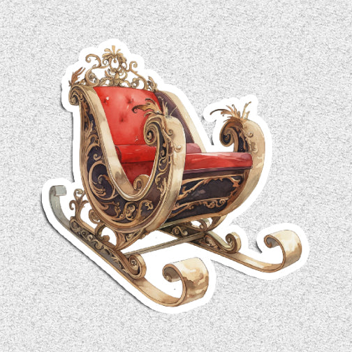 Decorative sleigh with intricate gold and red design on a textured gray background