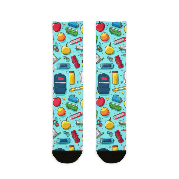 Colorful socks with school-themed design on a light blue background