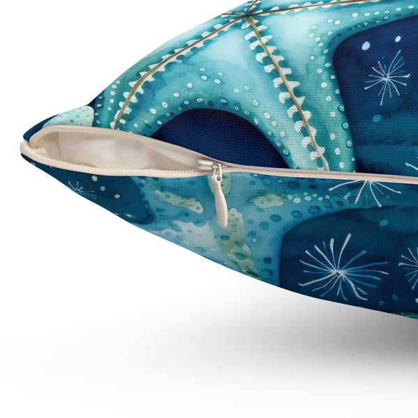 Close-up of a blue pillow with white patterns on a white background