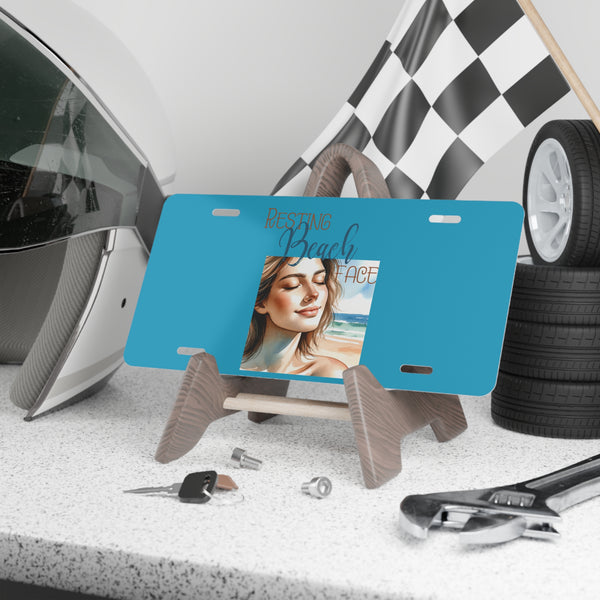 Resting beach face front license plate