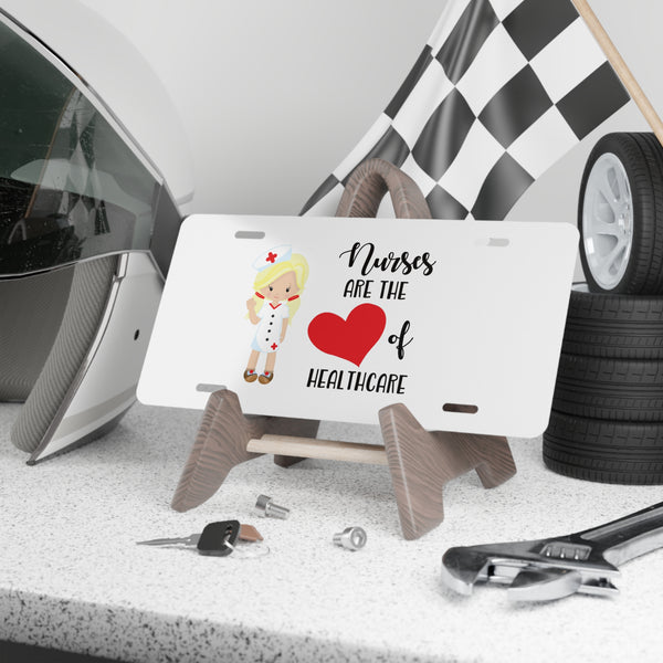 Nurses are the heart of healthcare custom front license plate on a stand on the shelf.
