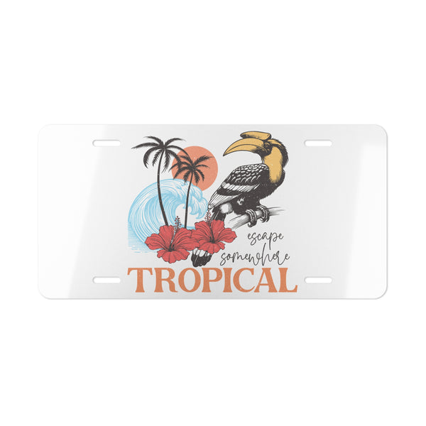 Decorative license plate with tropical design featuring a toucan, palm trees, and flowers on a white background.