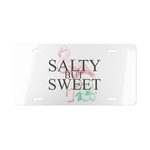 License plate with flamingo design and 'Salty But Sweet' text on a white background