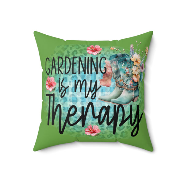 Decorative pillow with 'Gardening is my Therapy' text, floral design, and boot on a green background.