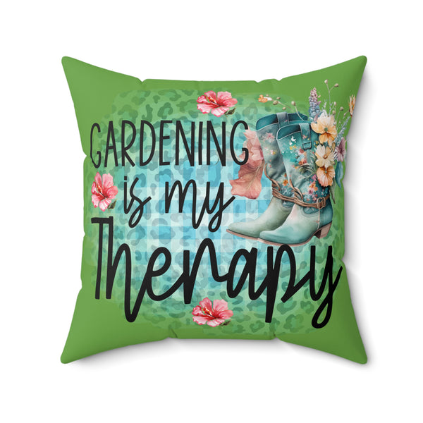 Decorative pillow with 'Gardening is my Therapy' text, floral design, and boots on a green background.