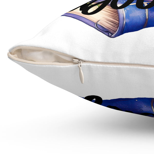 Pillow with a design of a book and a face on a white background