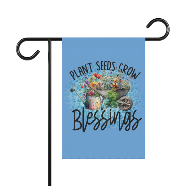 Garden flag with 'Plant Seeds Grow Blessings' text and wheelbarrow design on a blue background.