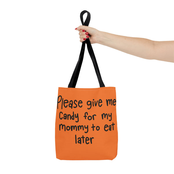 Please Give me Candy Halloween Trick or Treat Bag in a hand on a white background