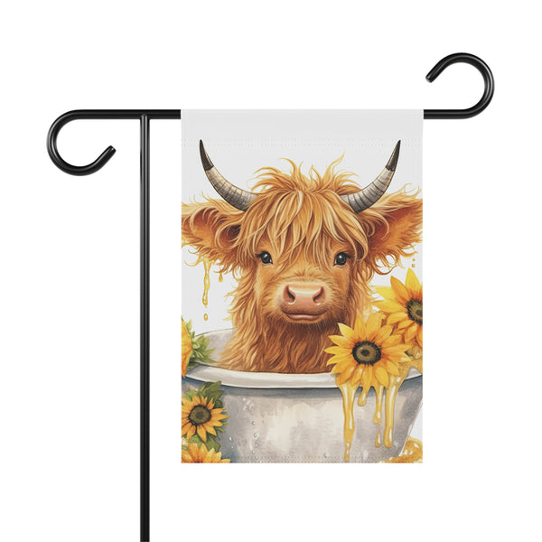 Decorative garden flag with a highland cow and sunflowers on a white background.