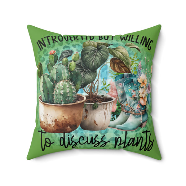 Decorative pillow with plants and boots design on a green background
