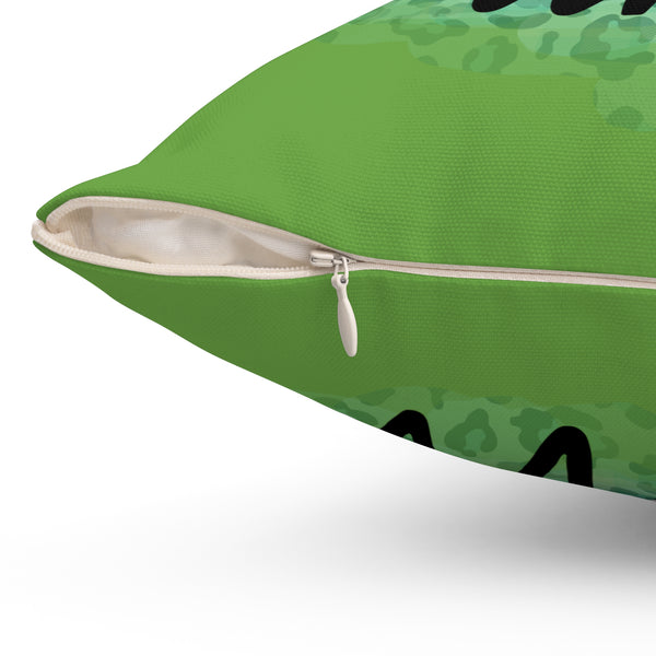 Green pillow with zipper on a white background