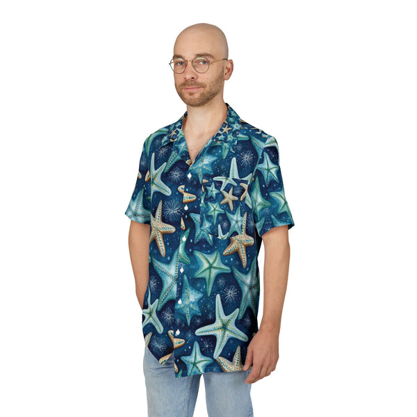 Man wearing a blue shirt with starfish pattern on a white background