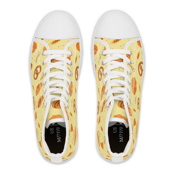 Pair of sneakers with a pizza pattern on a white background