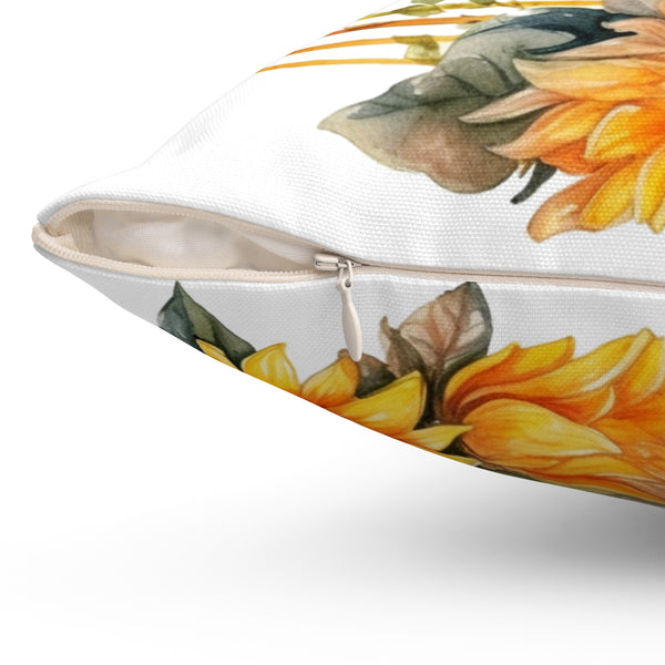 Decorative pillow with sunflower pattern on a white background