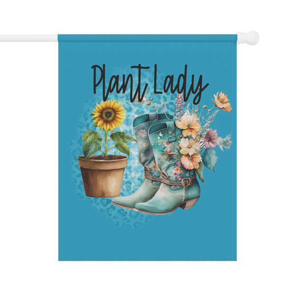 Decorative flag with 'Plant Lady' text, sunflower, potted plant, and green boots on a blue background.
