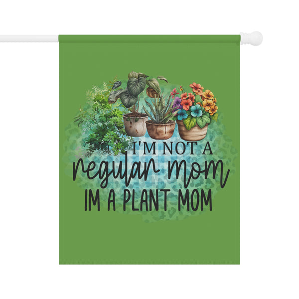 Decorative flag with plants and text 'I'm not a regular mom, I'm a plant mom' on a green background.