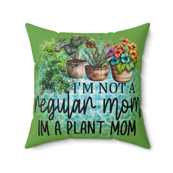 Decorative pillow with plant-themed design and text on a white background