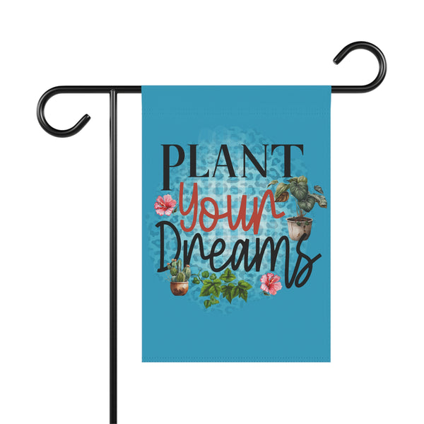 Garden flag with 'Plant Your Dreams' text and plant illustrations on a blue background