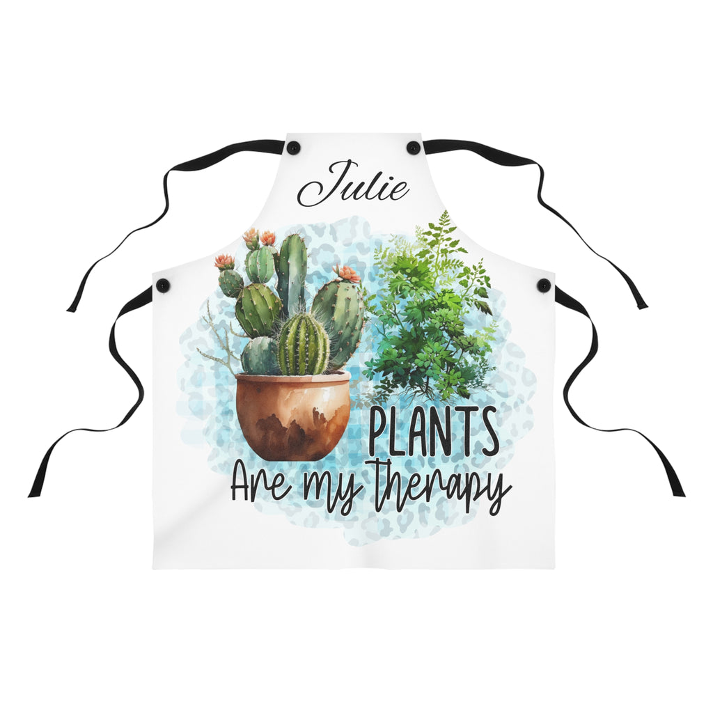 Apron with cactus design and 'Plants are my therapy' text on a white background