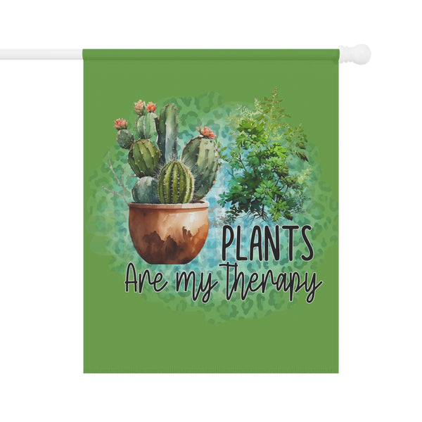 Decorative flag with cacti and text 'Plants are my therapy' on a green background