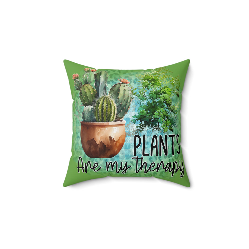 Decorative pillow with cactus design and 'Plants are my therapy' text on a white background