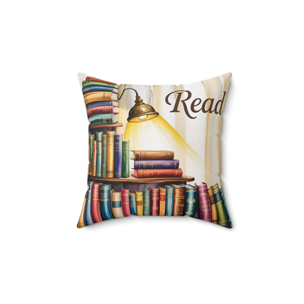 Decorative pillow with bookshelf and 'Read' text design on a white background