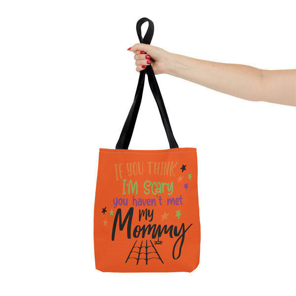 Scary Mommy Halloween Trick or Treat Bag being held up on a white background.