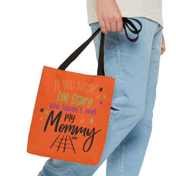 Scary Mommy Halloween Trick or Treat Bag in a guy's hands