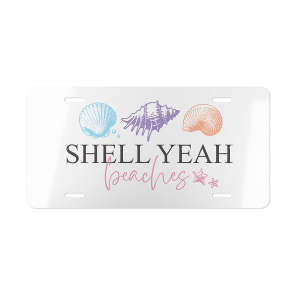 License plate with shell designs and 'Shell Yeah Beaches' text on a white background