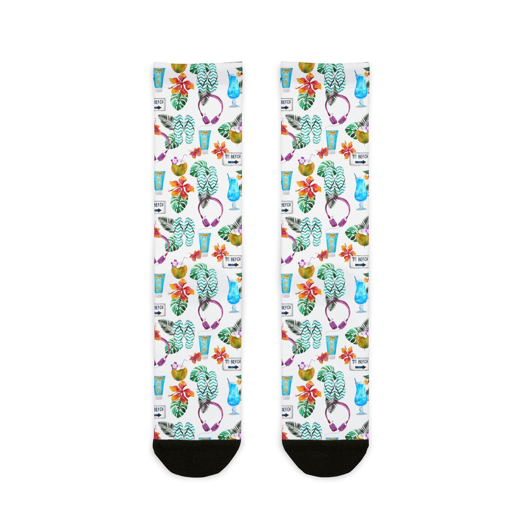 Colorful socks with floral and cup patterns on a white background