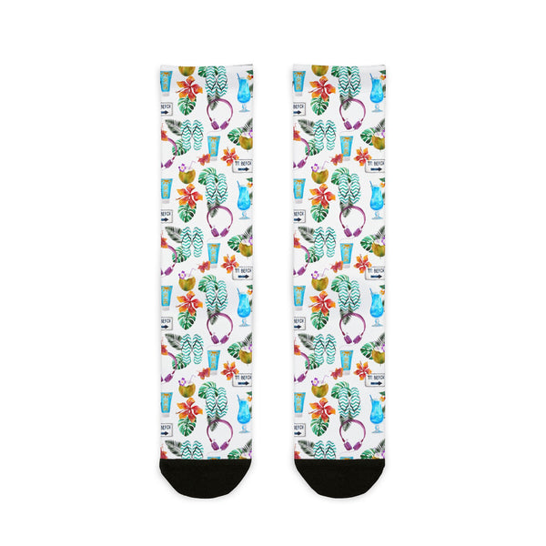 Colorful socks with floral and cup patterns on a white background