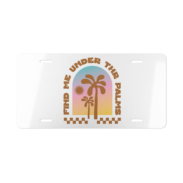License plate with palm tree design and text 'Find me under the palms' on a white background