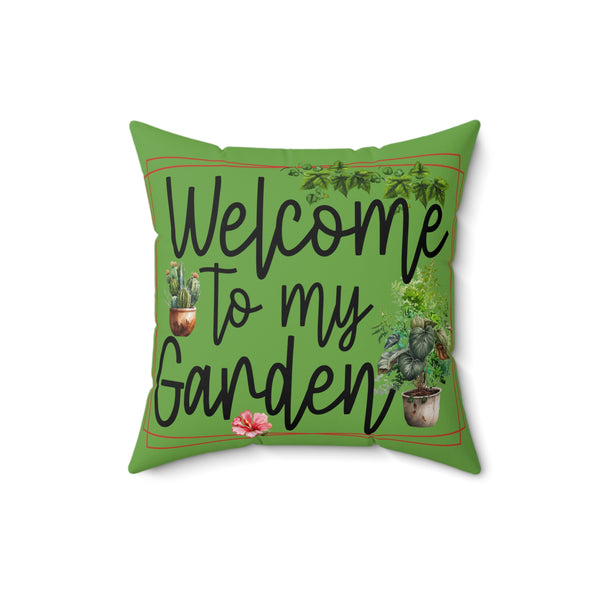 Green pillow with 'Welcome to my Garden' text and gardening-themed illustrations on a white background