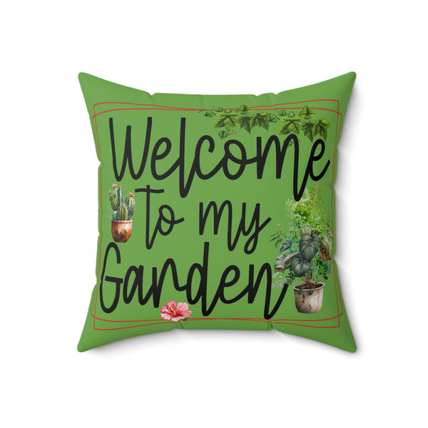Green pillow with 'Welcome to my Garden' text and plant illustrations on a white background
