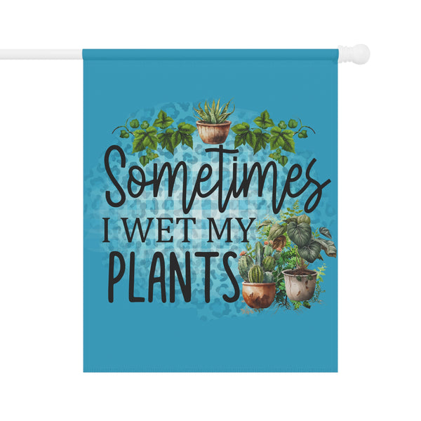 Decorative flag with plants and text 'Sometimes I wet my plants' on a blue background