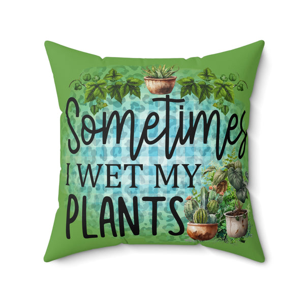 Green pillow with plant-themed text and illustrations on a white background