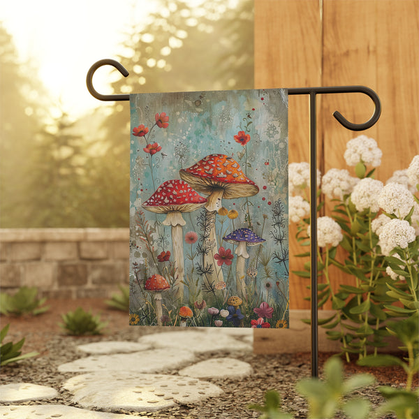 Decorative garden flag with mushrooms and flowers on a stand in a garden setting.