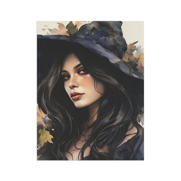 Artistic depiction of a woman wearing a witch hat with autumn leaves.