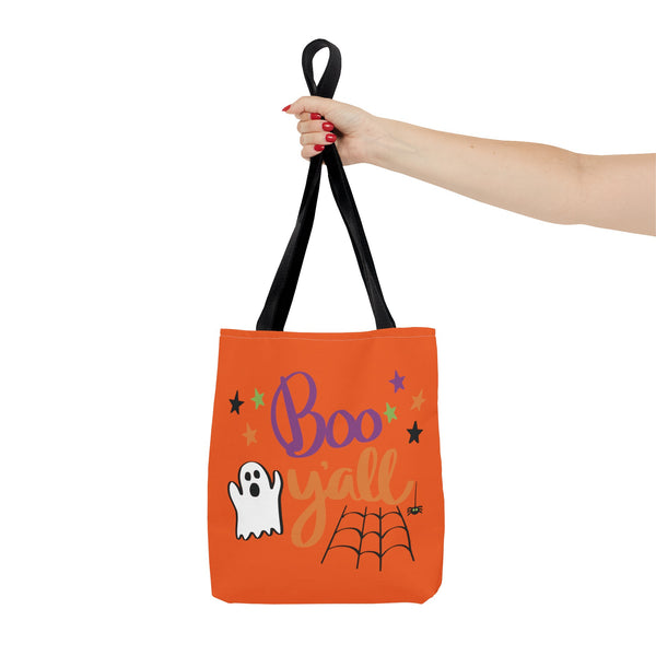 Boo Y'all Halloween Trick or Treat Bag in a woman's hand on a white background